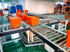 Belt-Driven Roller Conveyor for Box-Type Cargo